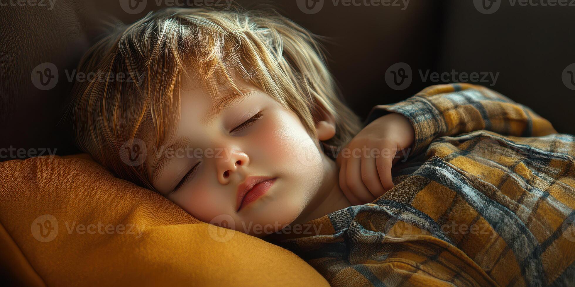 Young boy peacefully sleeping on a cozy couch with a soft pillow during a sunny afternoon photo
