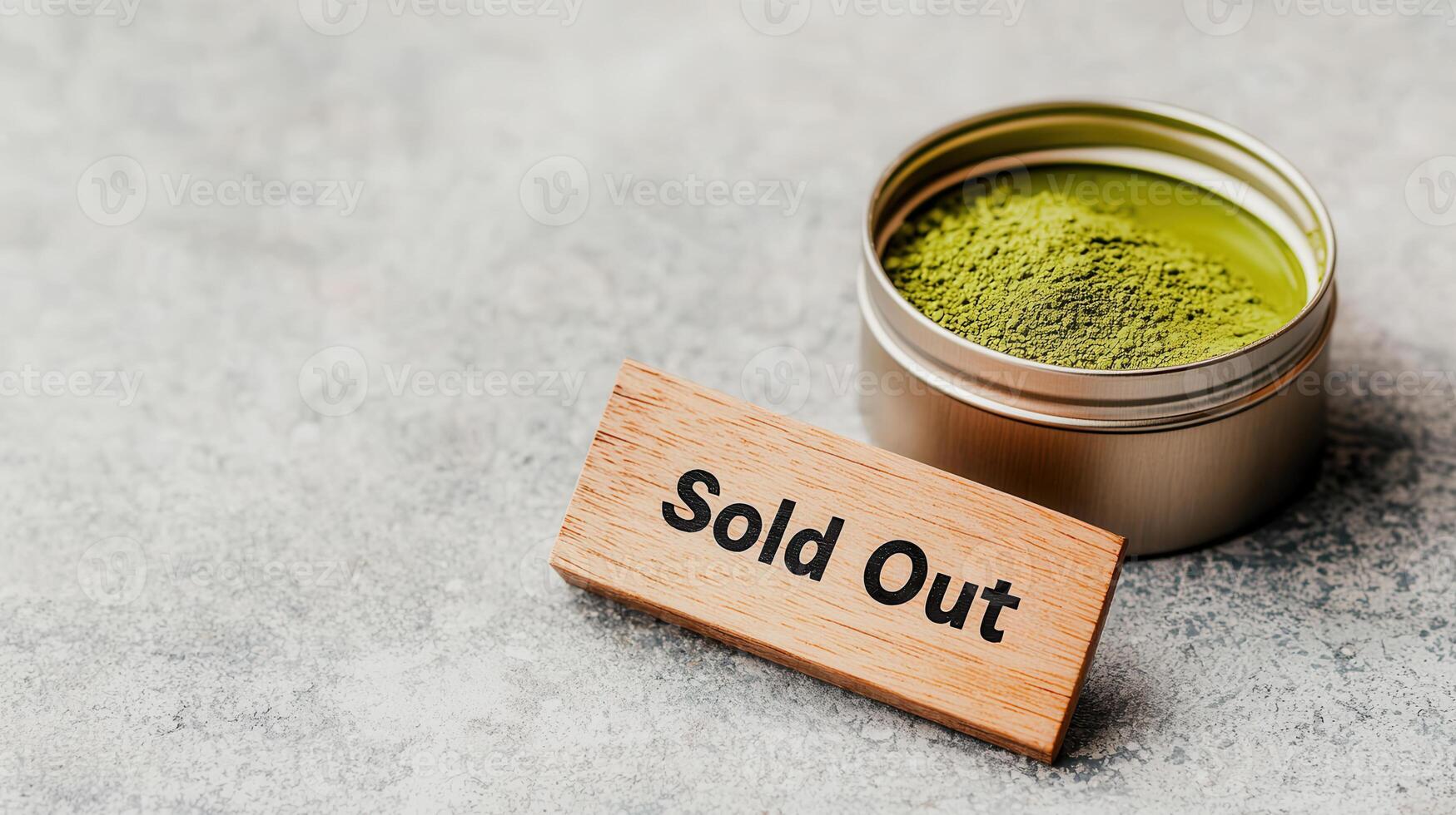 minimalist wooden sign reads Sold Out next to tin of green powder photo