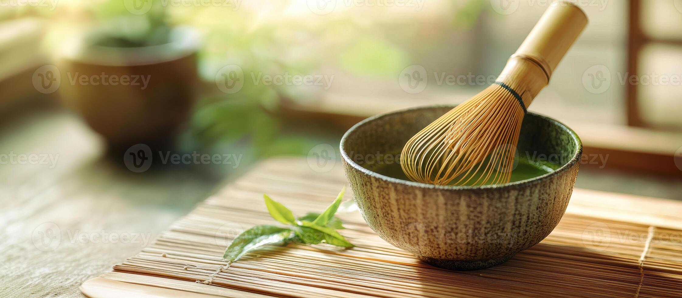 serene scene of matcha green tea preparation with bamboo whisk and bowl, evoking tranquility and mindfulness photo