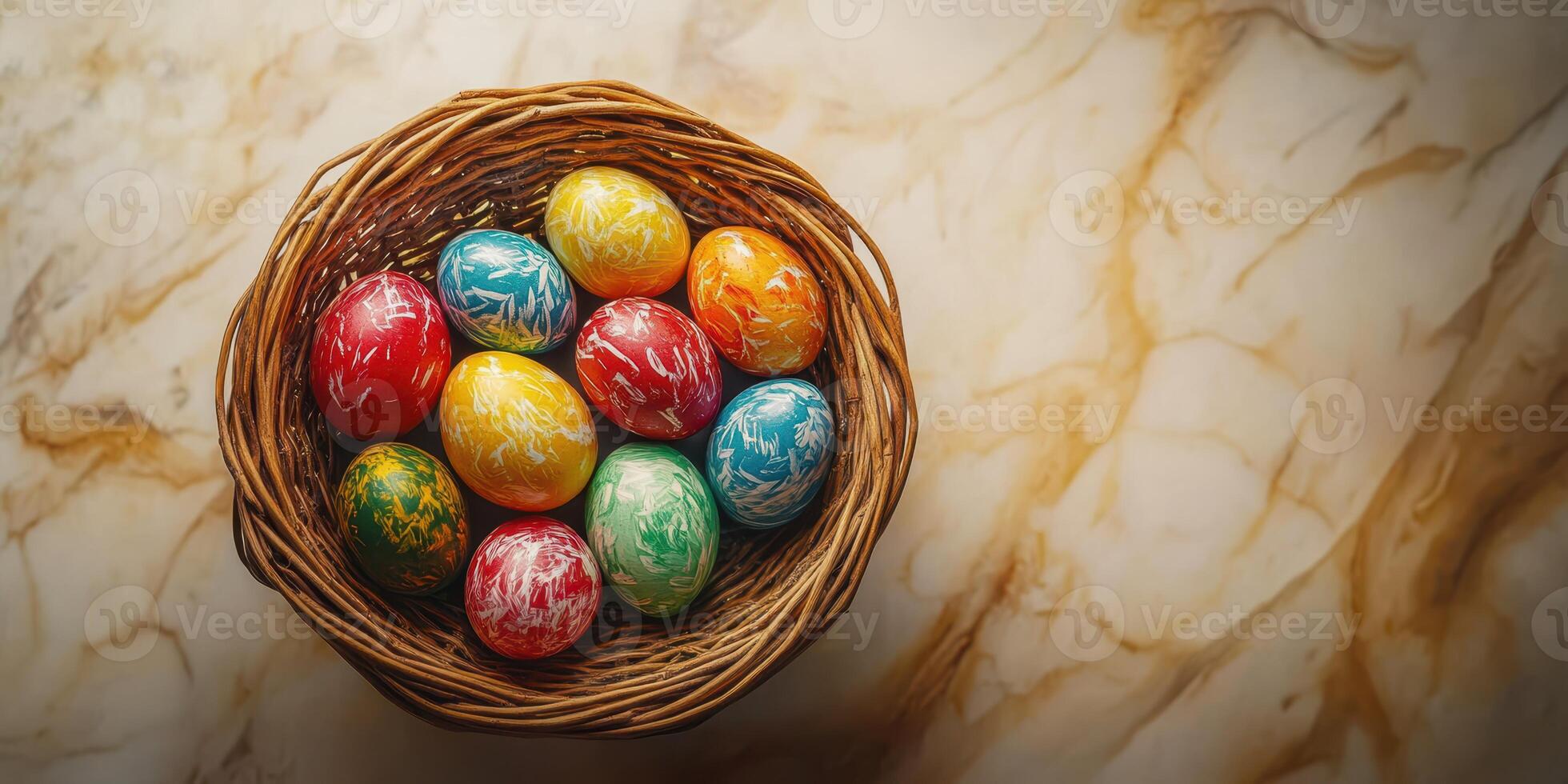 Colorful Easter eggs arranged in a wicker basket on a marble surface during the spring season photo
