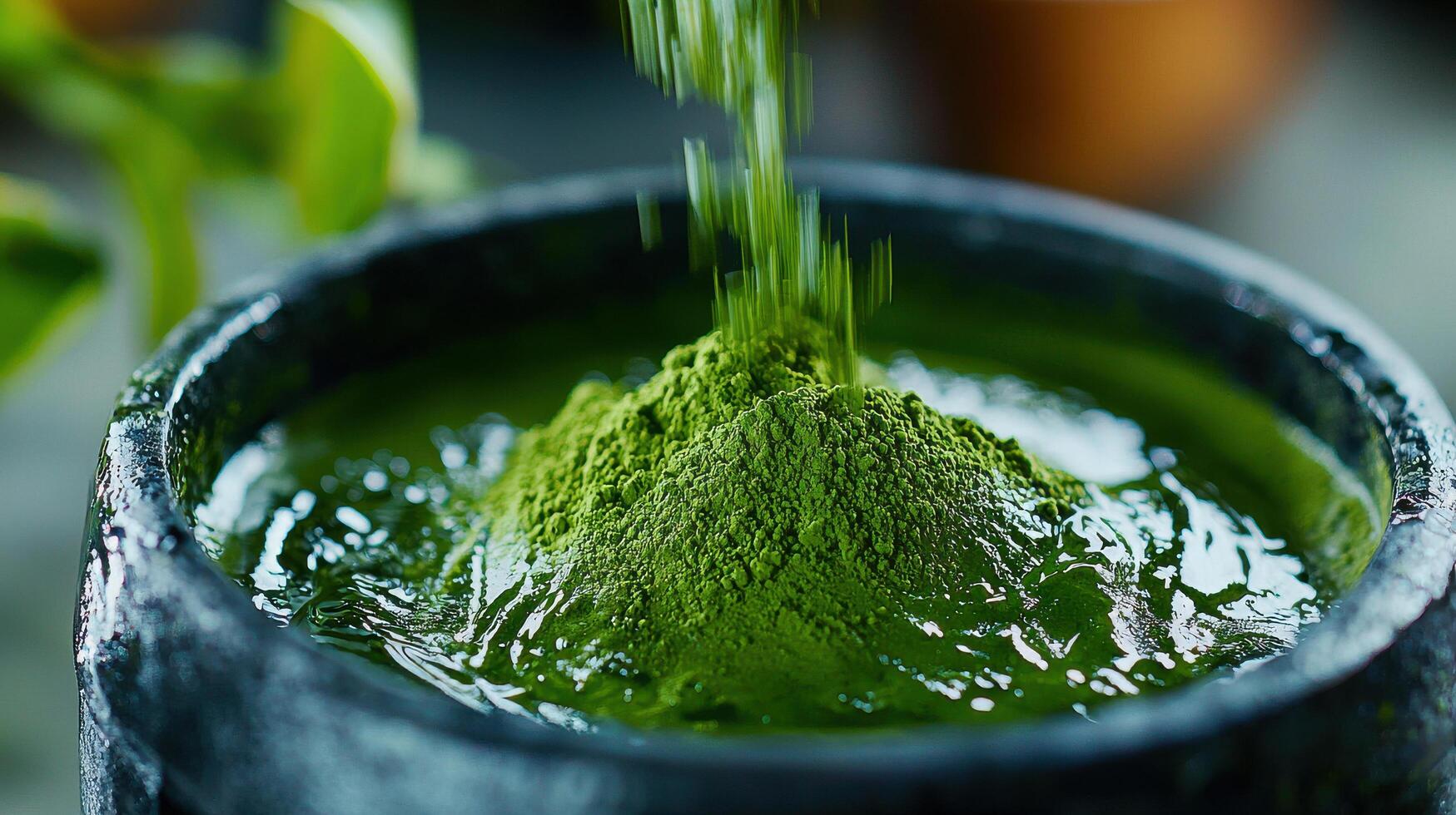 stream of matcha powder is flowing into bowl, creating vibrant green mound. scene evokes sense of tranquility and focus photo