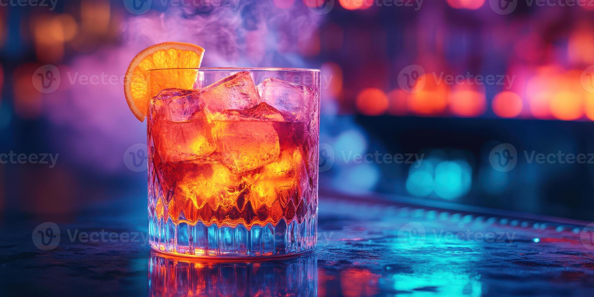Colorful cocktail with citrus garnish sitting on a bar counter during a lively night out photo