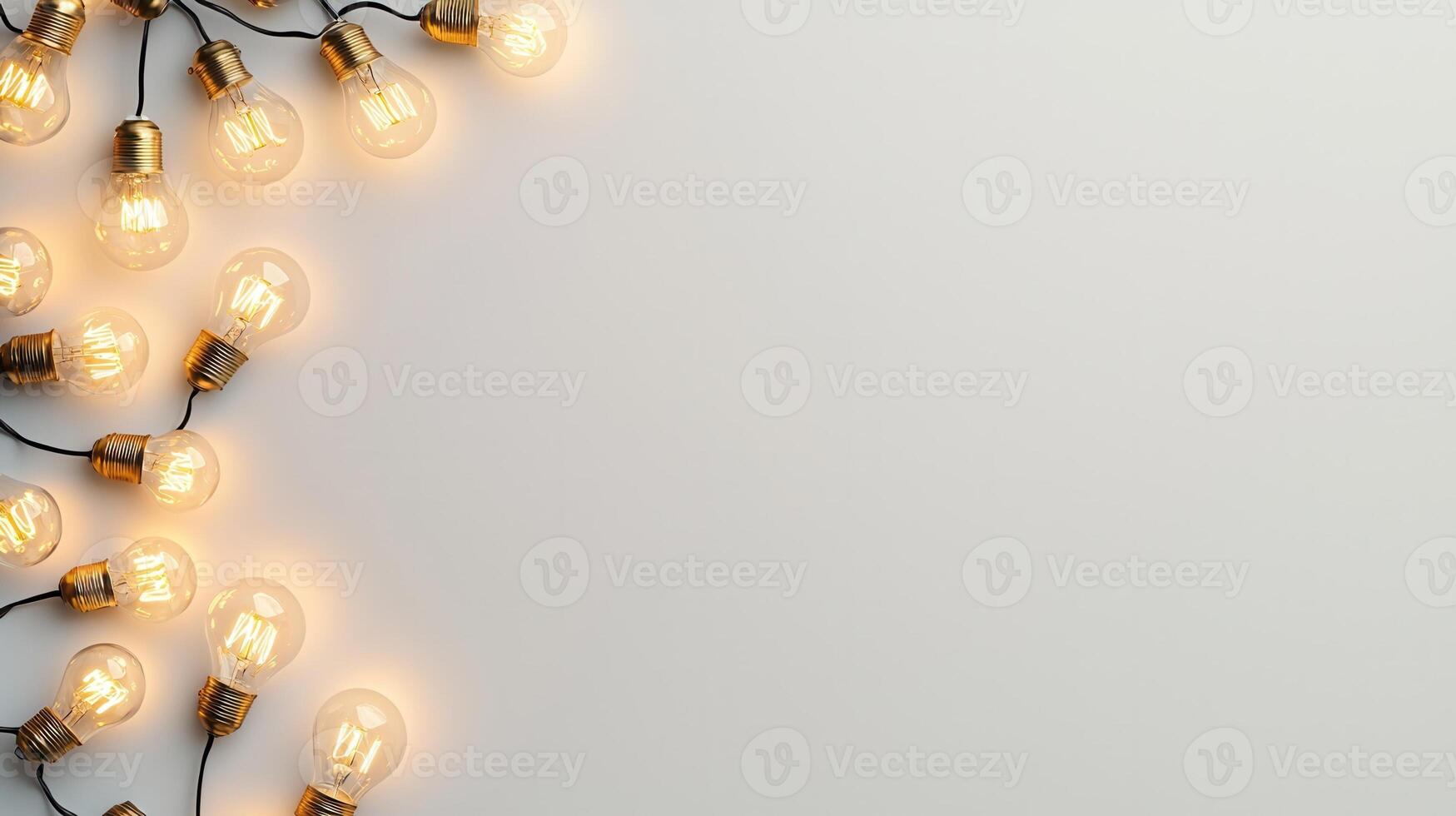 Lit christmas light bulbs hanging from a beige string against a pink wall create a warm, inviting atmosphere background Copy space for text photo