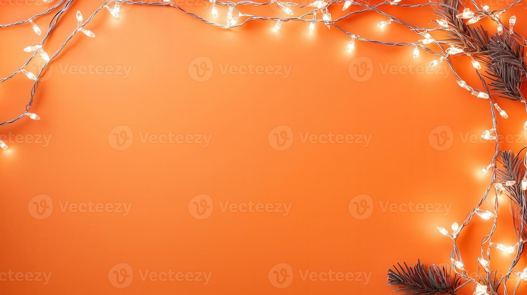 Christmas lights creating a glowing frame on a orange backdrop, perfect for holiday season greetings and festive designs with copy space photo