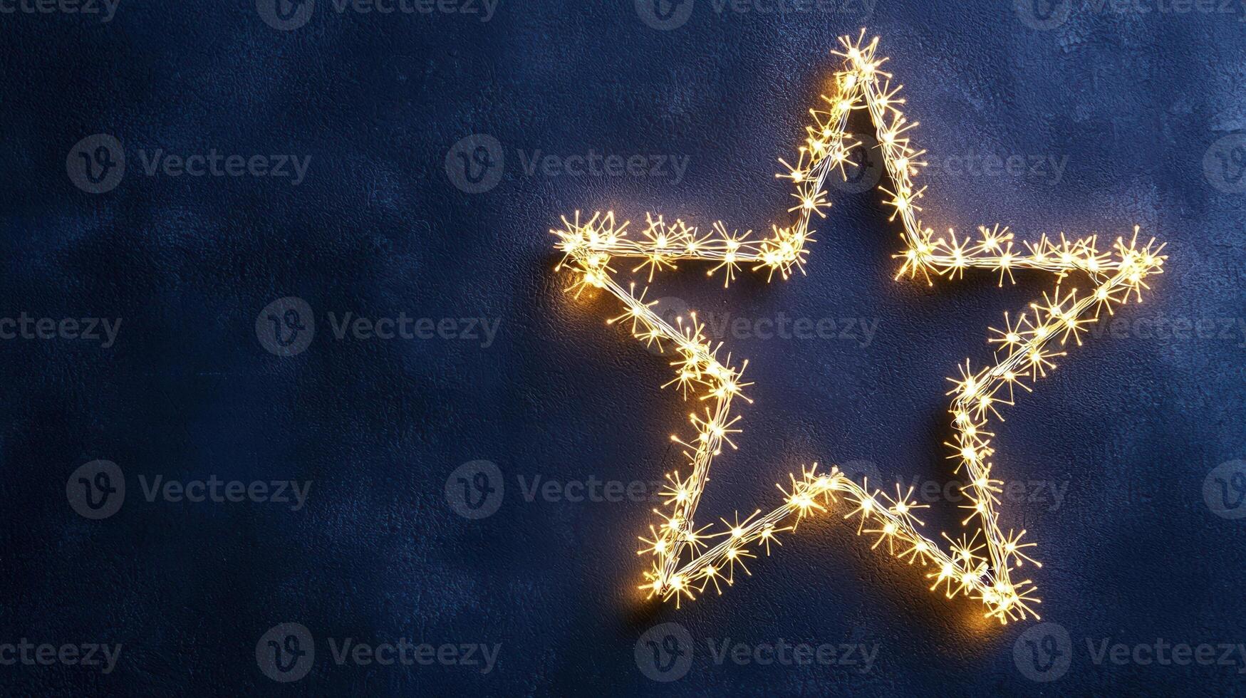Glowing star shaped light bursting through shadowy background, radiating festive brilliance Copy space for text photo