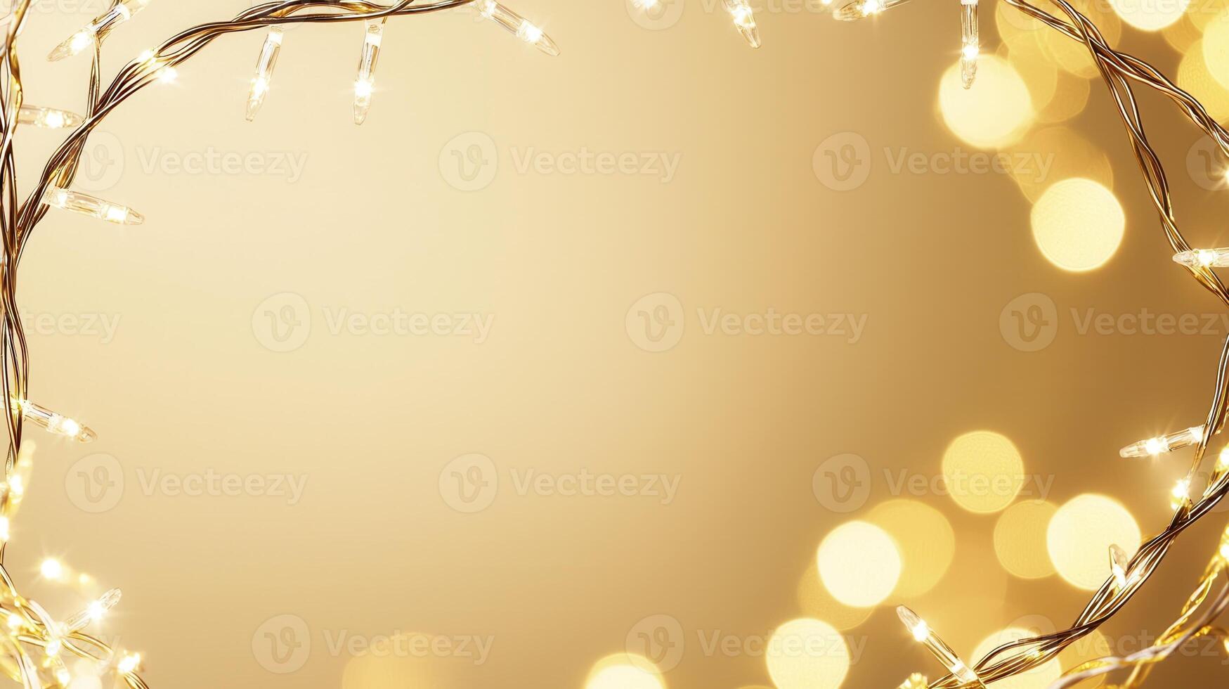 Christmas golden lights illuminating white creating frame on light blue background, perfect for winter holidays greeting card photo