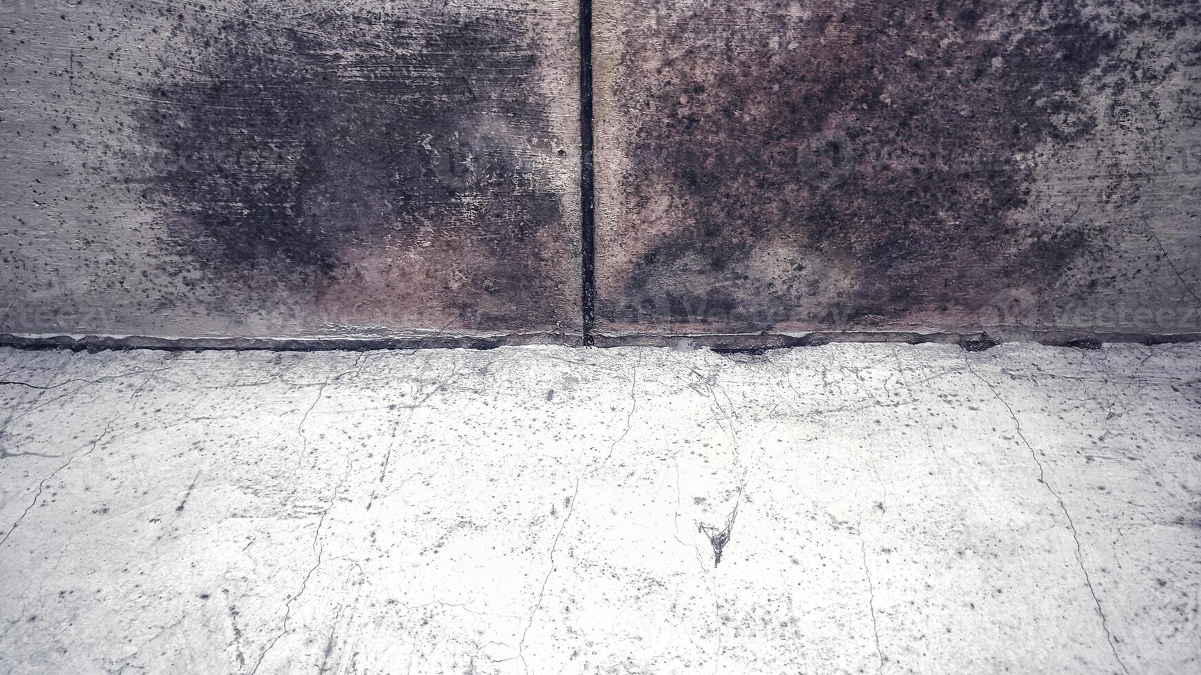 corner wall background with crack effect and grunge textured photo