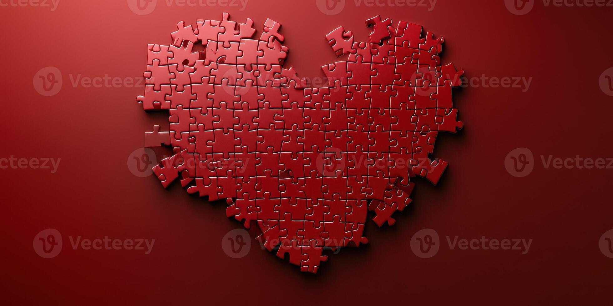 Heart-shaped red puzzle pieces arranged on a vibrant red background creating a symbol of love and connection photo
