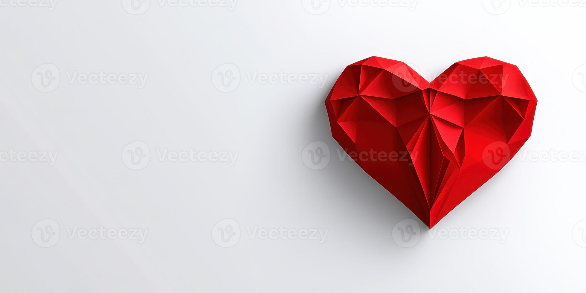 Red origami heart representing love crafted from paper placed on a clean, white background photo