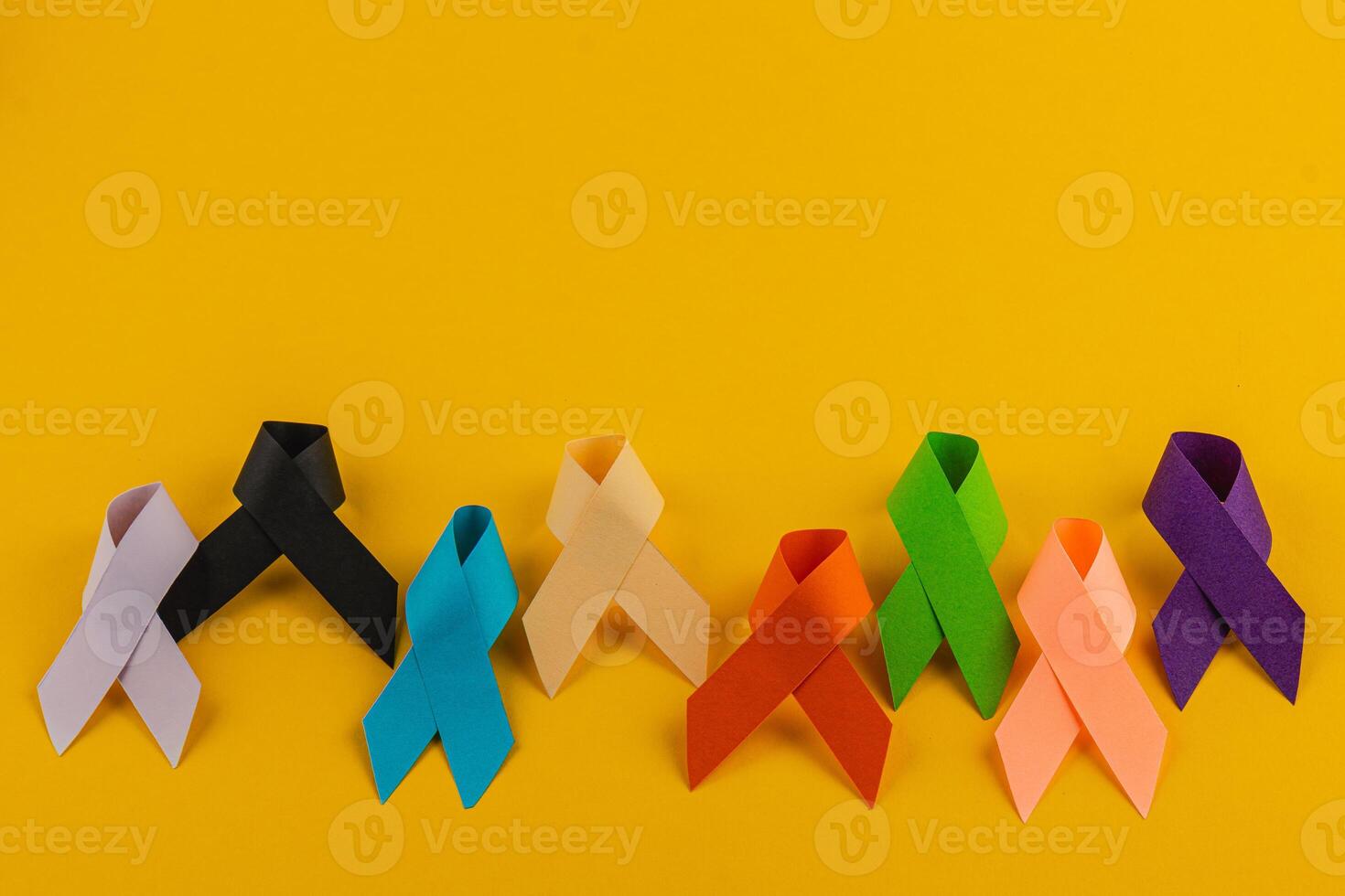 Colorful awareness ribbons representing various health campaigns and diseases photo
