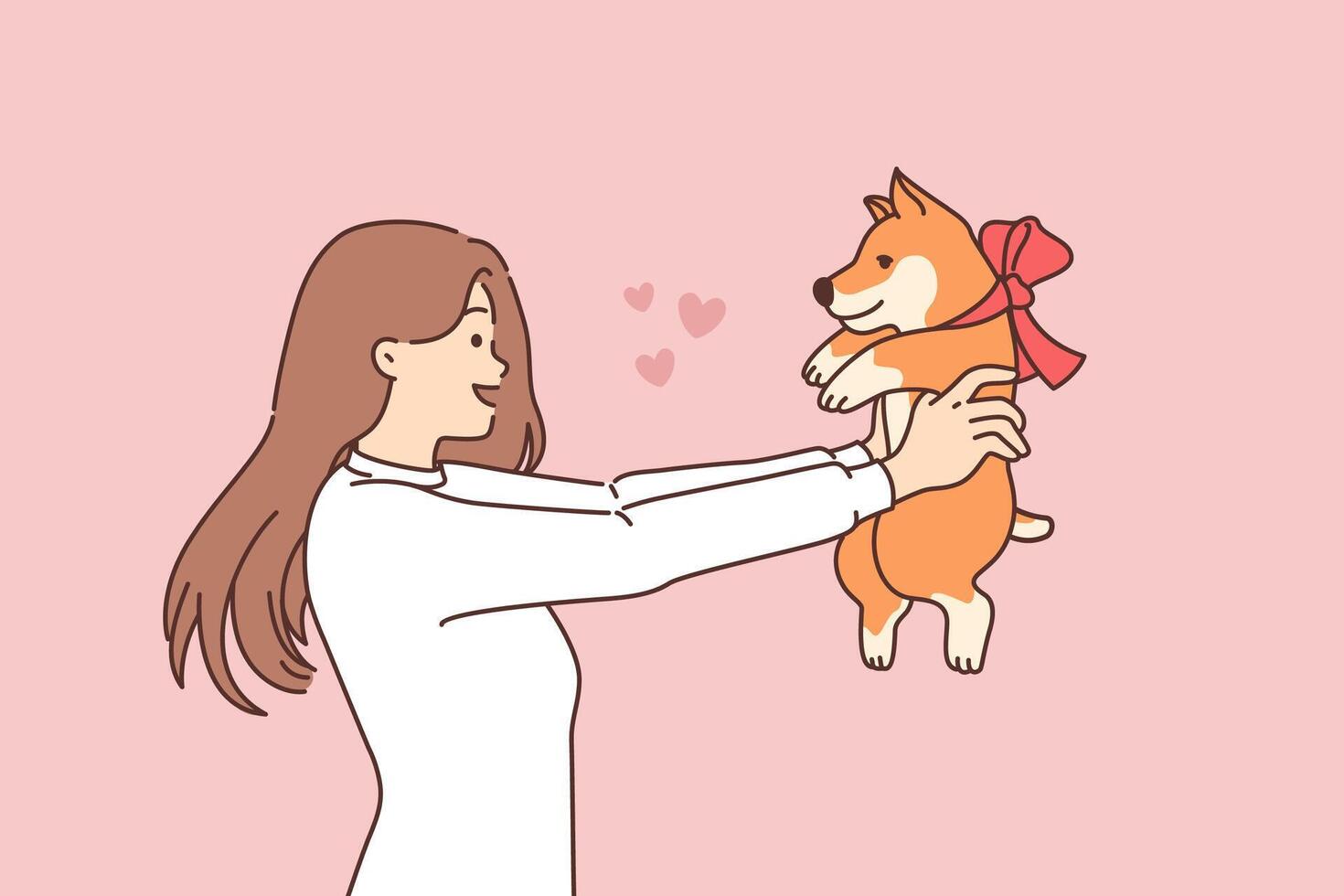 Woman received dog as birthday present and holds small puppy with bow around neck in hands vector