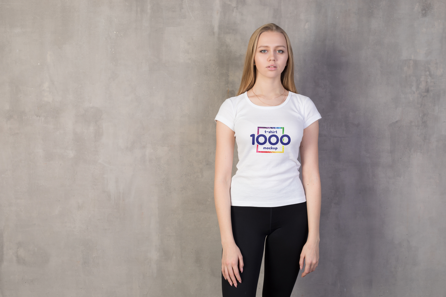 Young Woman in White T-Shirt with Product Mockup Design - Studio Shot psd