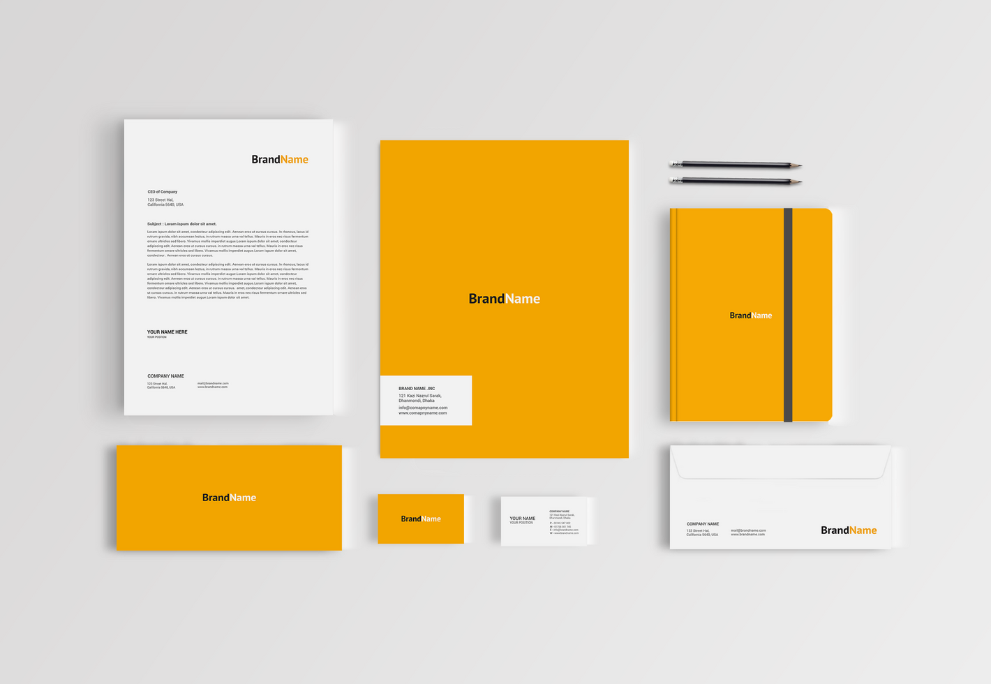 Stationary Mockup Front View Design with Pen psd