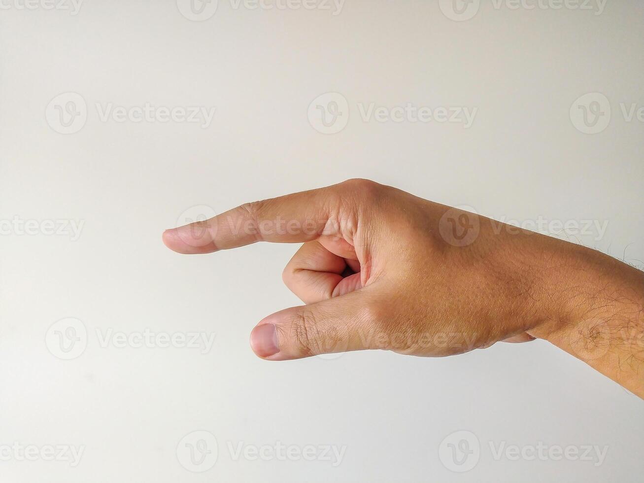 Closeup of a male hand gesturing, subtly suggesting small size or picking up a tiny object. Clean, minimalist style against a plain white background. photo