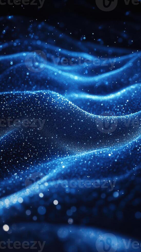 Blue shimmering waves of light create a mesmerizing pattern in a dark environment, evoking a sense of depth and tranquility photo