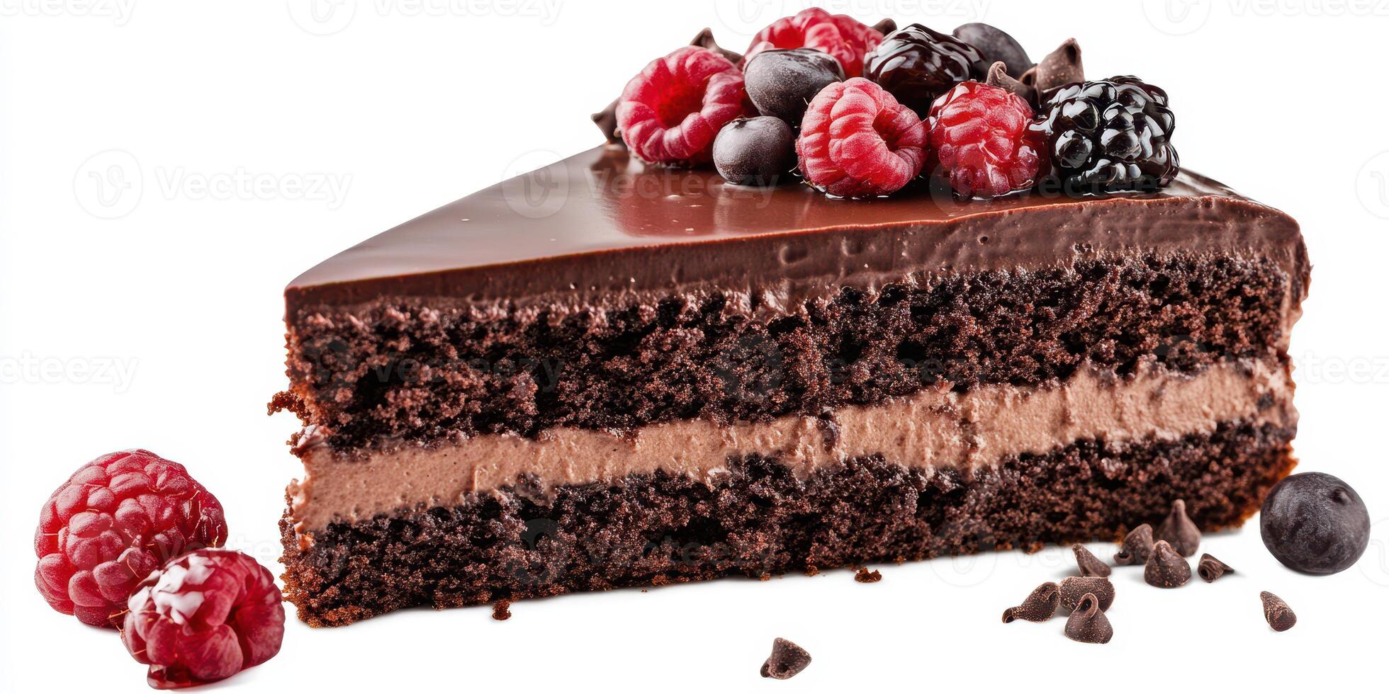 Decadent chocolate cake layered with rich mousse and topped with fresh berries photo