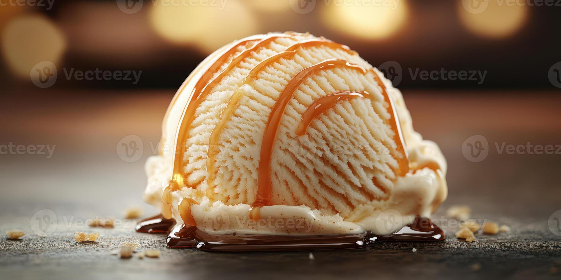 Delicious vanilla ice cream topped with caramel sauce served in a cozy setting during the evening photo