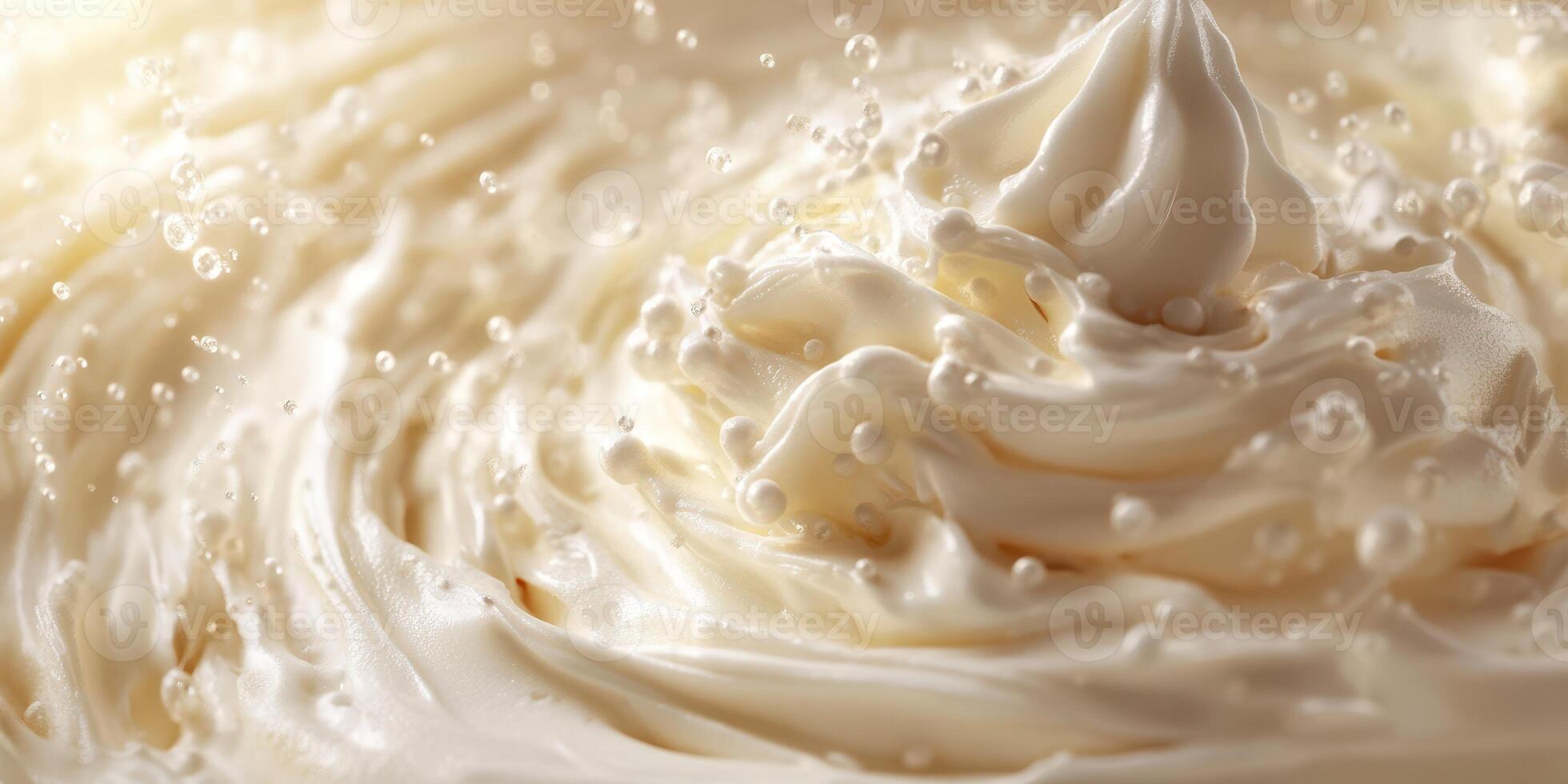 Cream swirls and bubbles create an appetizing texture in a close-up shot of whipped cream photo