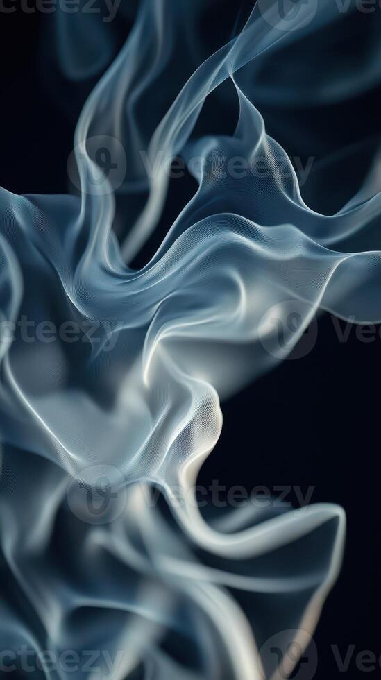 Soft wisps of translucent fabric flow gracefully in contrasting light and shadow photo