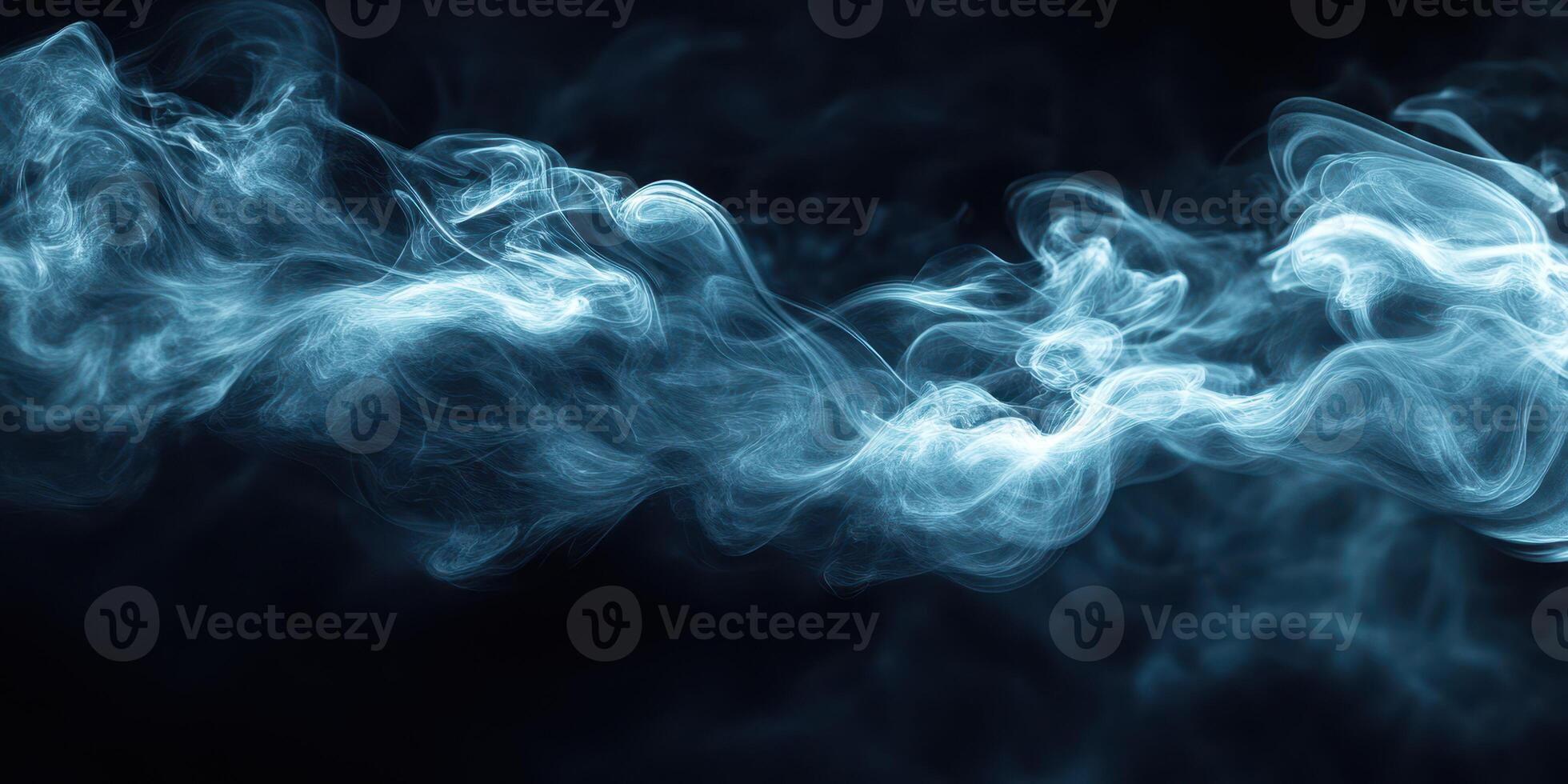 Mystical blue smoke swirling in darkness creates an ethereal atmosphere perfect for artistic backgrounds photo