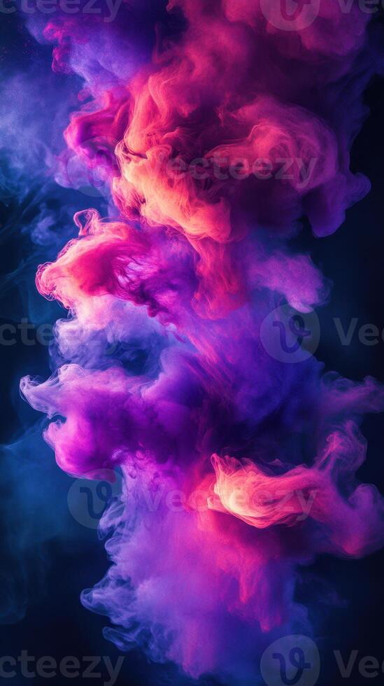 Vibrant colors swirl together in a captivating display of purple and orange hues in a dark background photo