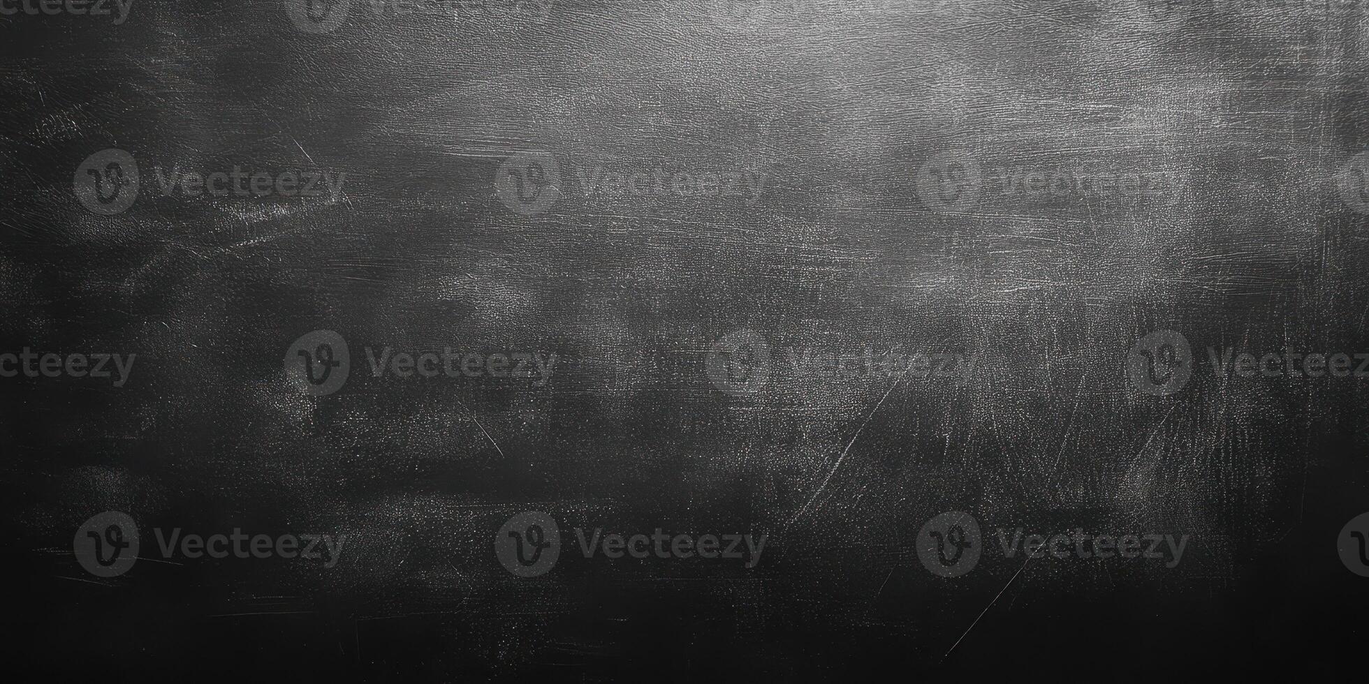 Textured dark surface with subtle scratches and a matte finish suitable for creative backgrounds and designs photo