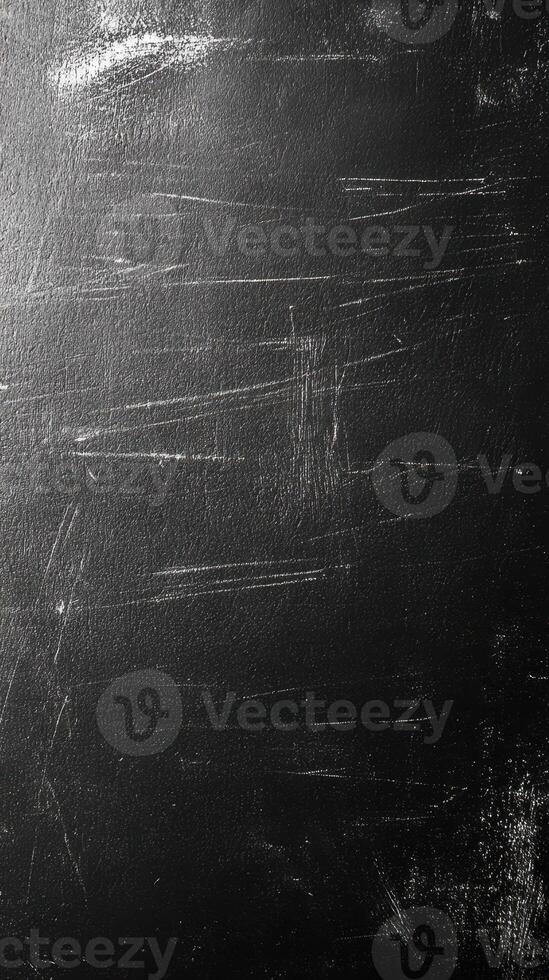 Smooth black surface with subtle scratches observed in close-up during studio session photo