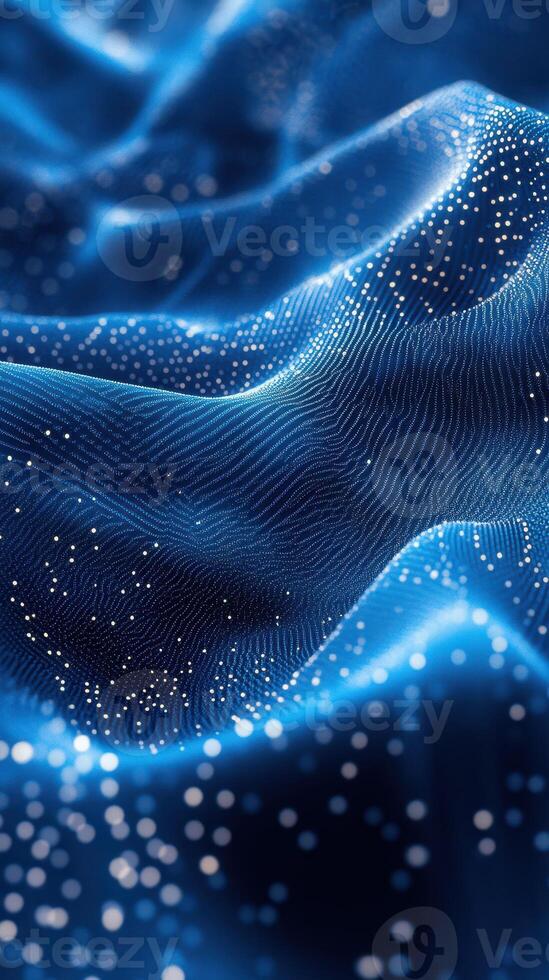 Waves of blue fabric with shimmering particles create an ethereal atmosphere in a tranquil setting photo