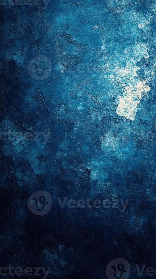 Textured blue wall with intricate patterns and gradients, creating a striking visual appeal in low light conditions photo