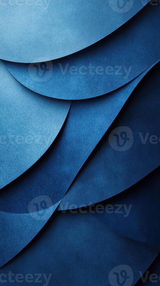 Colorful layers of blue paper create a dynamic texture in a creative art display showcasing depth and contrast photo