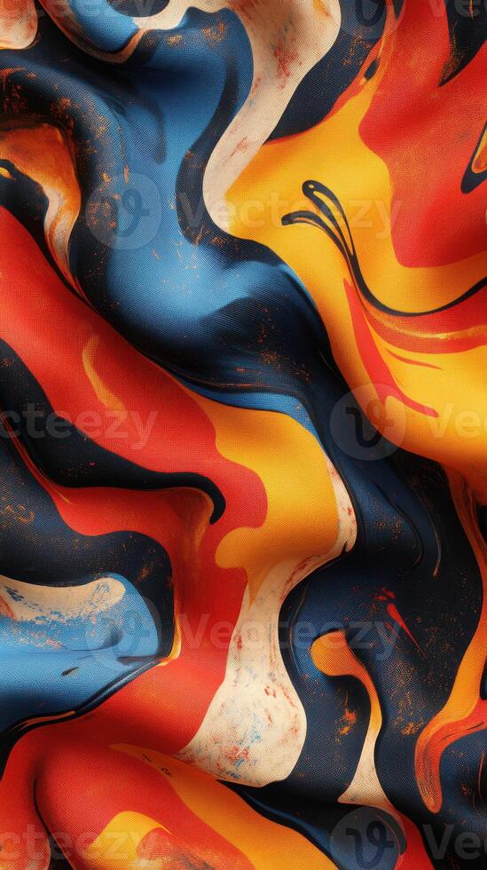 Colorful abstract fabric featuring swirling patterns in blue, red, yellow, and orange tones highlighting texture and design details photo