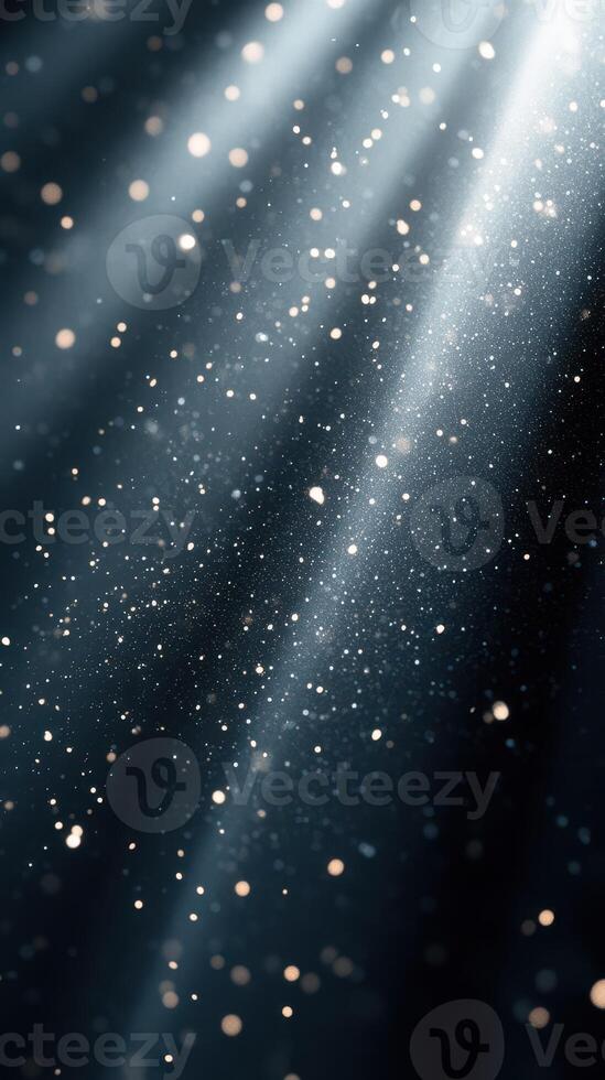 Mystical light beams illuminate floating dust particles in a tranquil indoor setting during evening hours photo