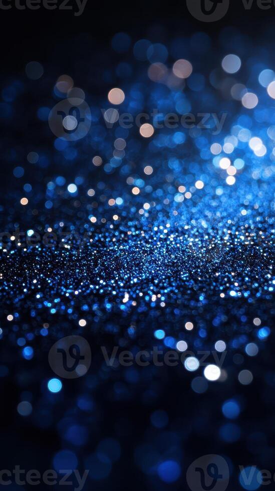 Blue glitter sparkles create an enchanting atmosphere ideal for celebrations and artistic projects during evening events photo