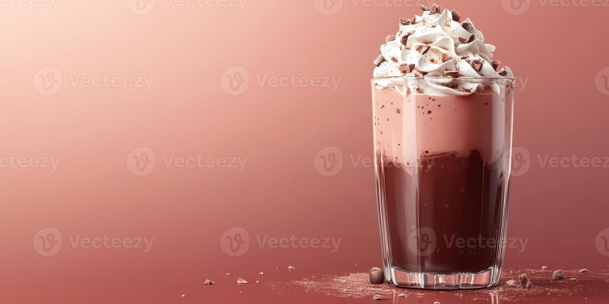 Creamy chocolate drink topped with whipped cream and chocolate shavings showcases dessert indulgence in a stylish glass photo