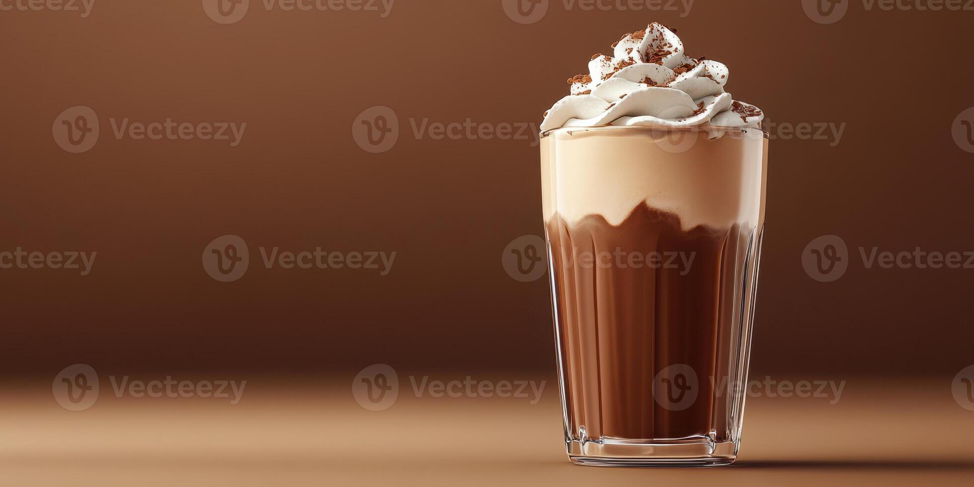 Delicious chocolate beverage topped with whipped cream and chocolate shavings in a glass photo