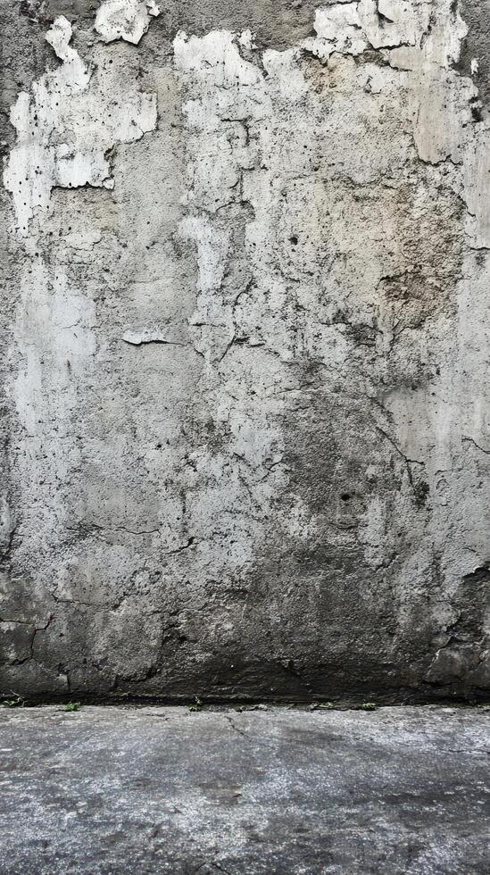 Textured wall with peeling paint in an urban setting during daylight hours photo