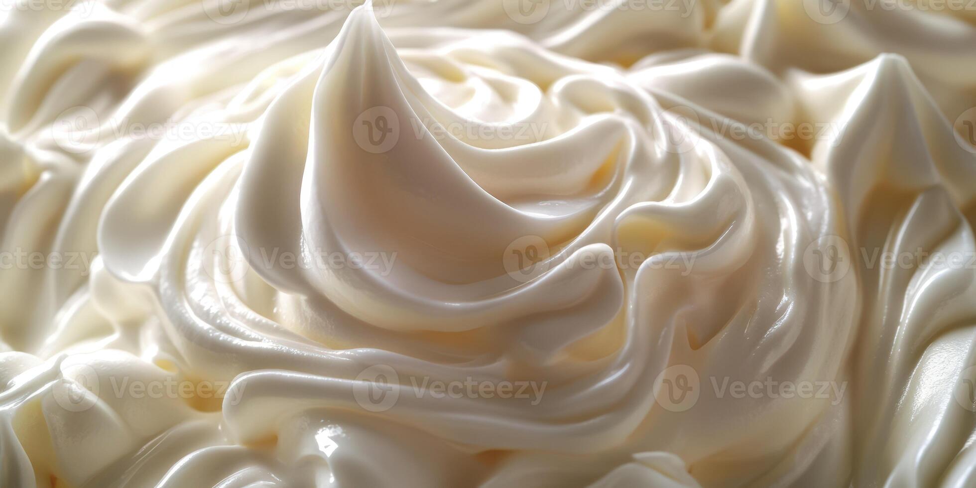 Swirls of creamy texture atop a dessert create an inviting and indulgent experience in a kitchen setting photo