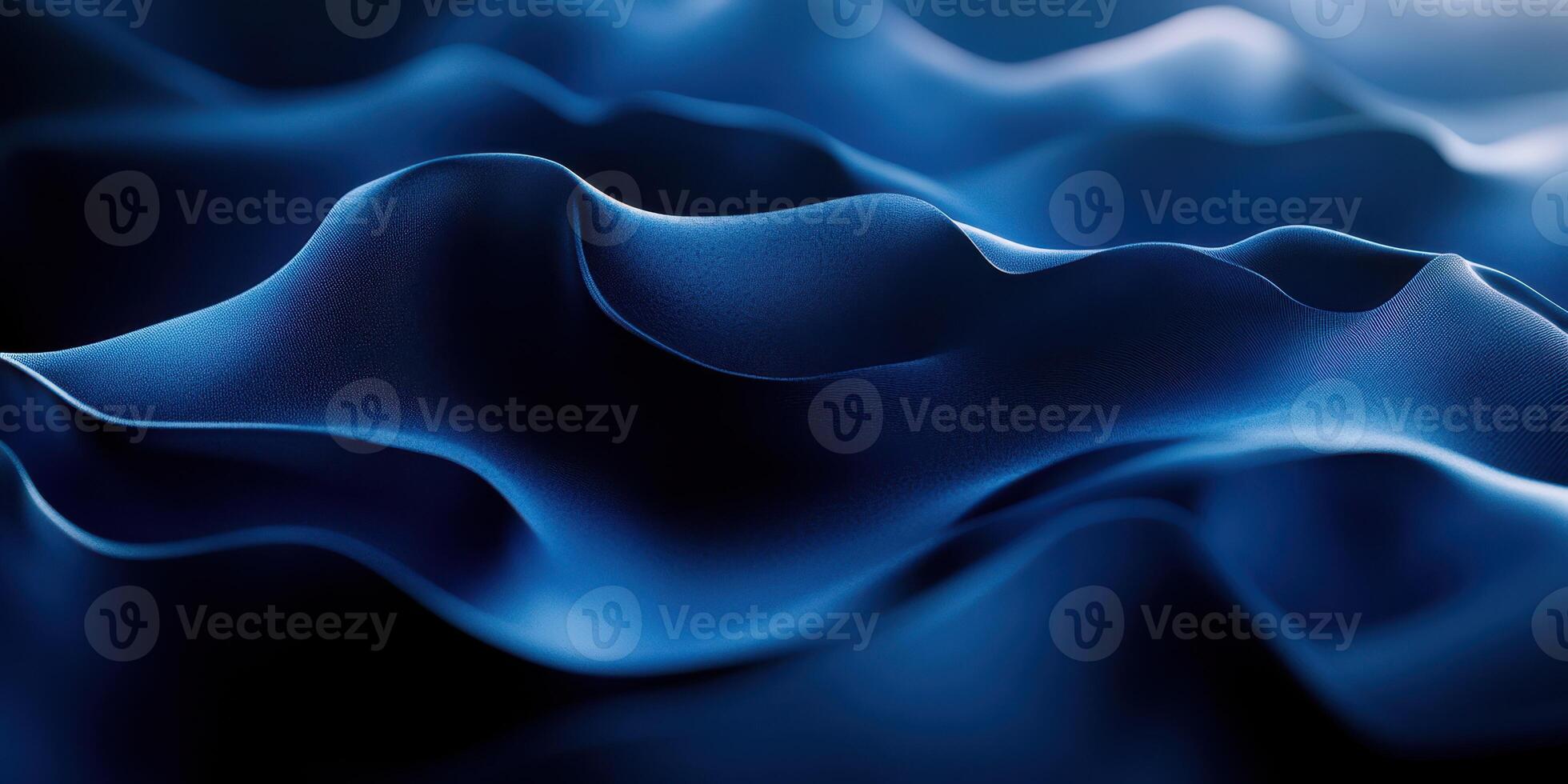Delicate waves of blue fabric create an elegant texture in soft light photo