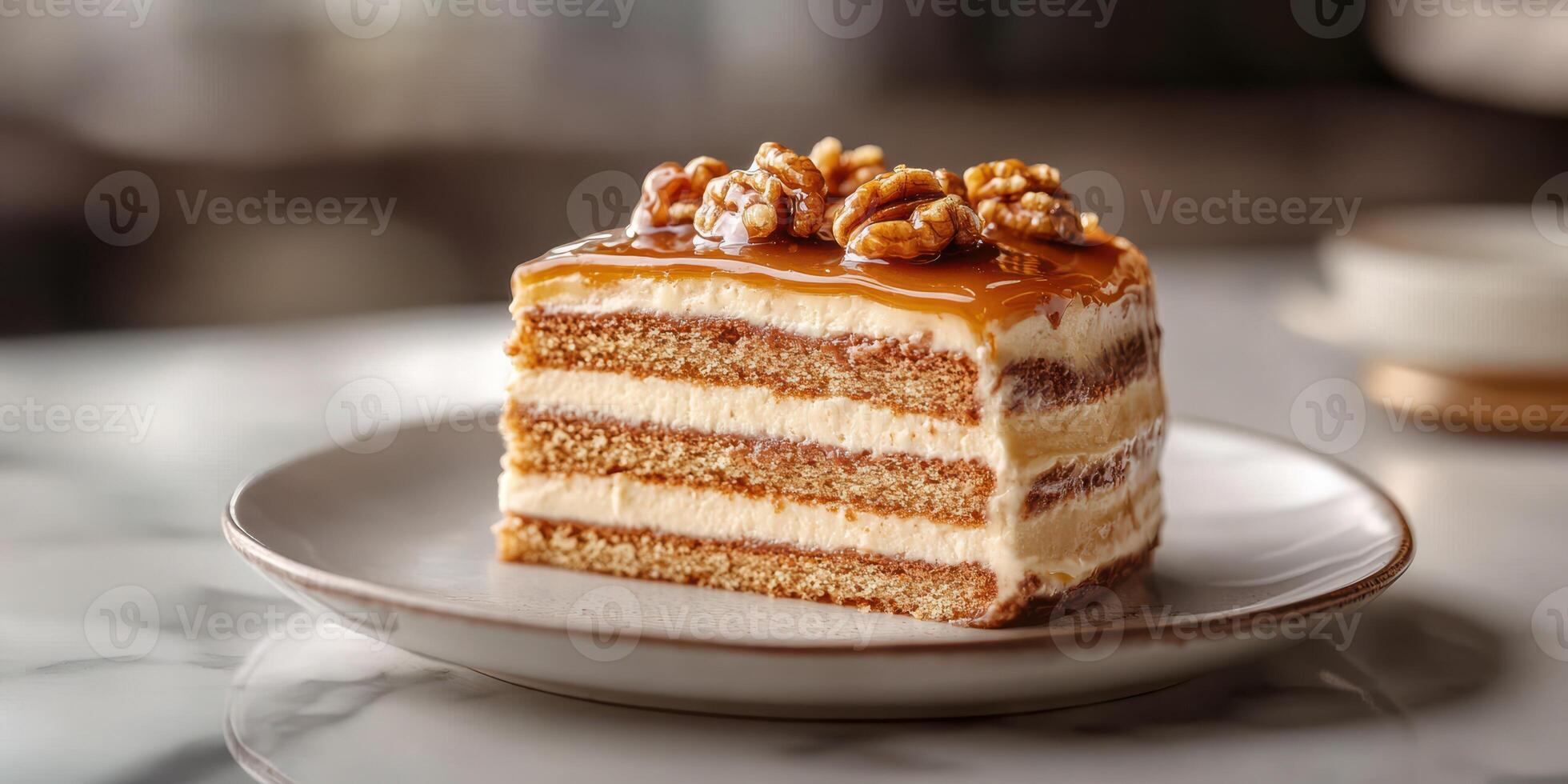 Delicious layered cake topped with caramel and walnuts served on a elegant plate photo