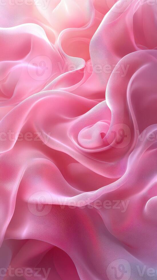 Soft pink fabric drapes gently highlighting delicate textures and flowing patterns photo