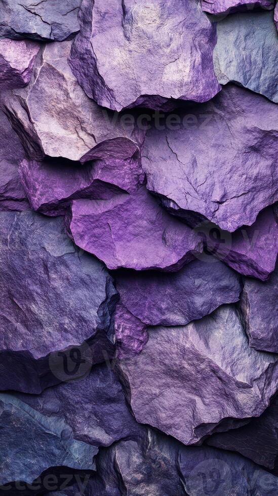 Colorful purple rocks create a striking pattern in a natural setting, showcasing geological beauty and vibrant hues photo