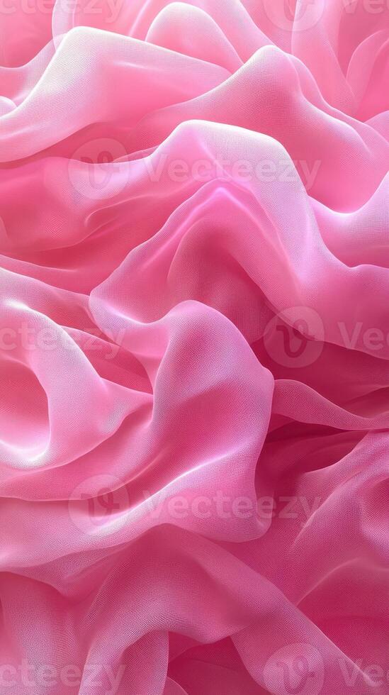 Soft pink fabric drapes elegantly in flowing, textured layers creating a delicate atmosphere photo