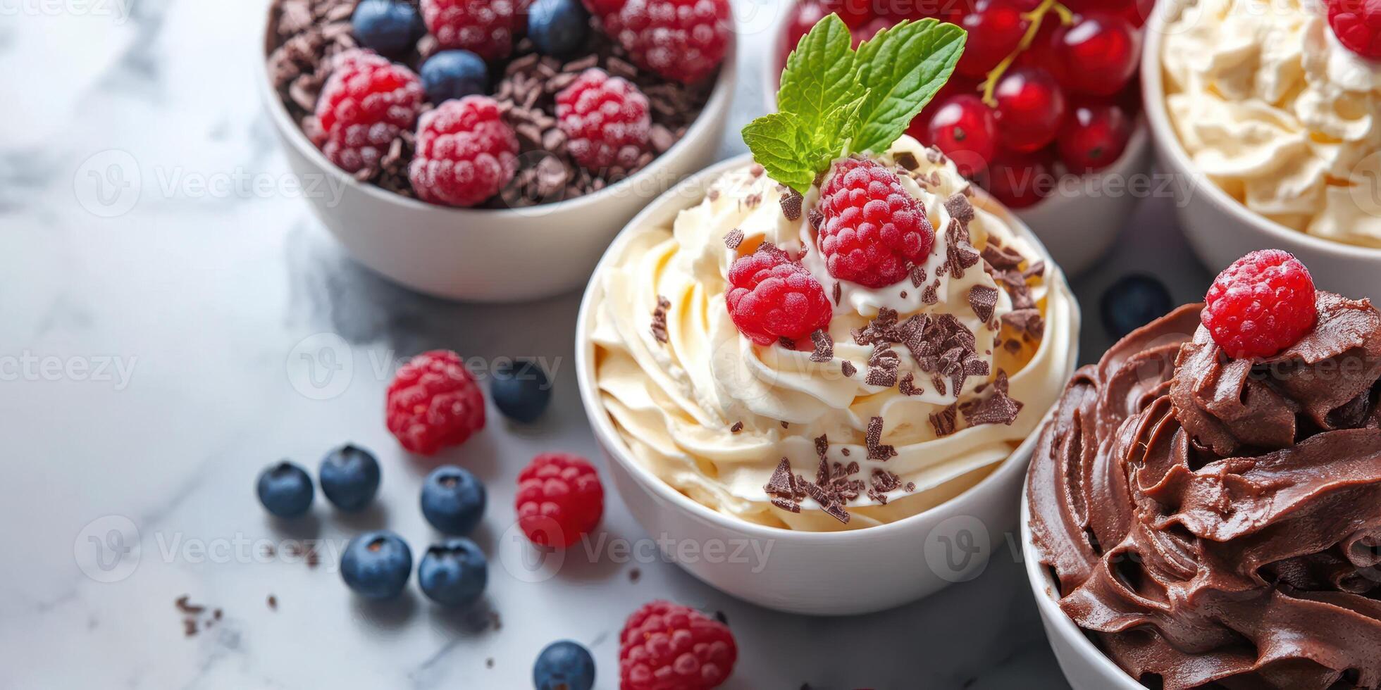 Delicious dessert bowls filled with cream, fresh berries, and chocolate shavings on a marble countertop at a summer gathering photo