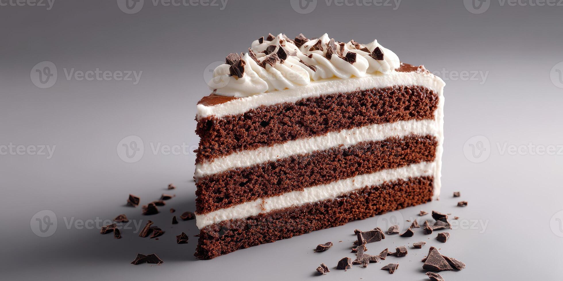 Delicious chocolate layer cake with whipped cream and chocolate shavings for a delightful dessert photo