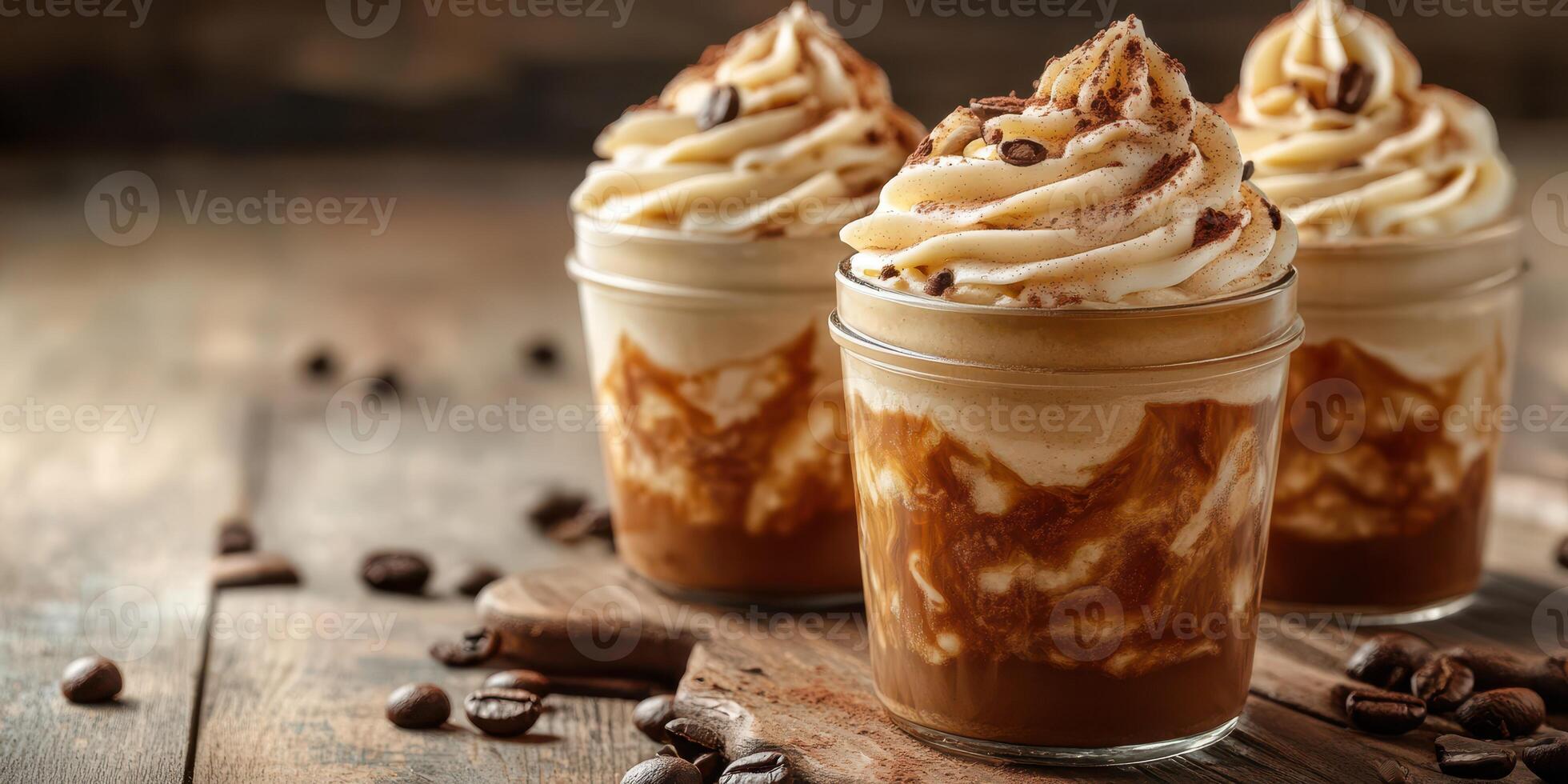 Creamy coffee dessert topped with whipped cream and cocoa served in glass jars on wooden table photo