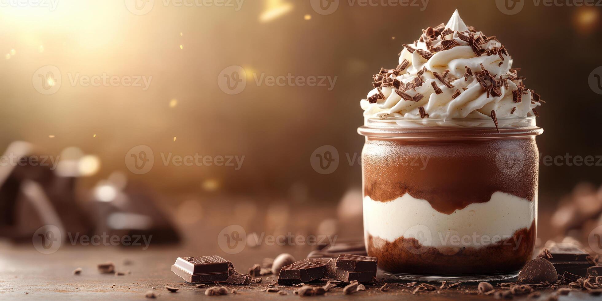 Rich chocolate dessert served in a jar with whipped cream and chocolate shavings in a cozy setting photo