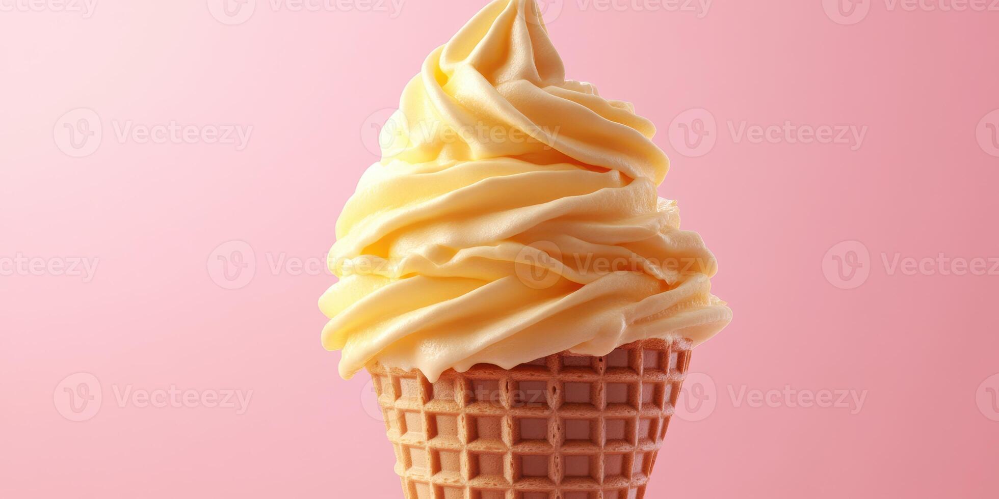 Soft serve ice cream in a cone with a creamy swirl against a pink background during summer photo