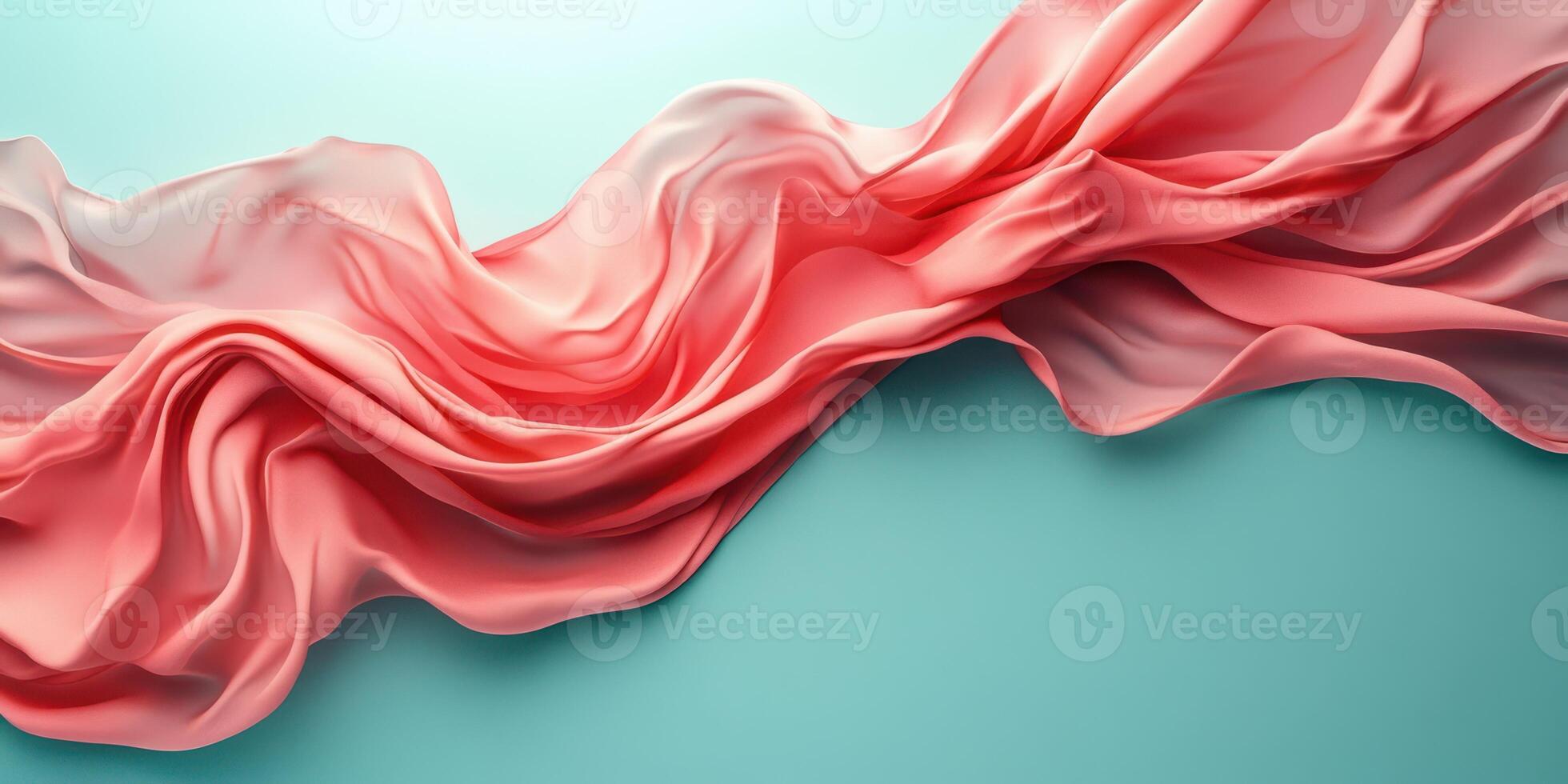 Flowing pink fabric draped over a turquoise background creates a soft and elegant visual display in contemporary design photo