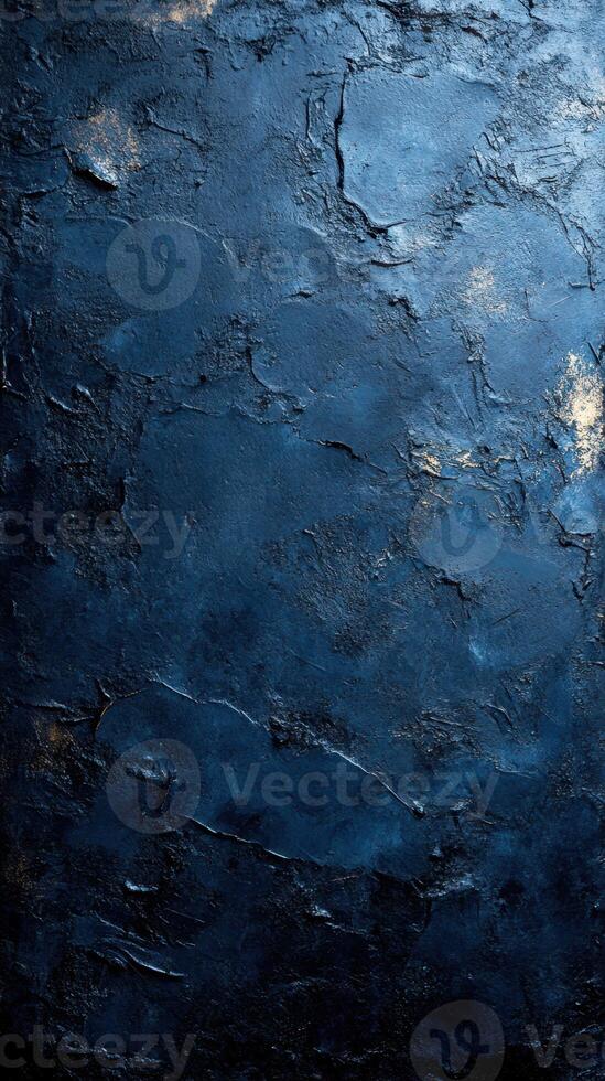 Textured dark blue wall with subtle highlights creating an atmospheric background effect photo