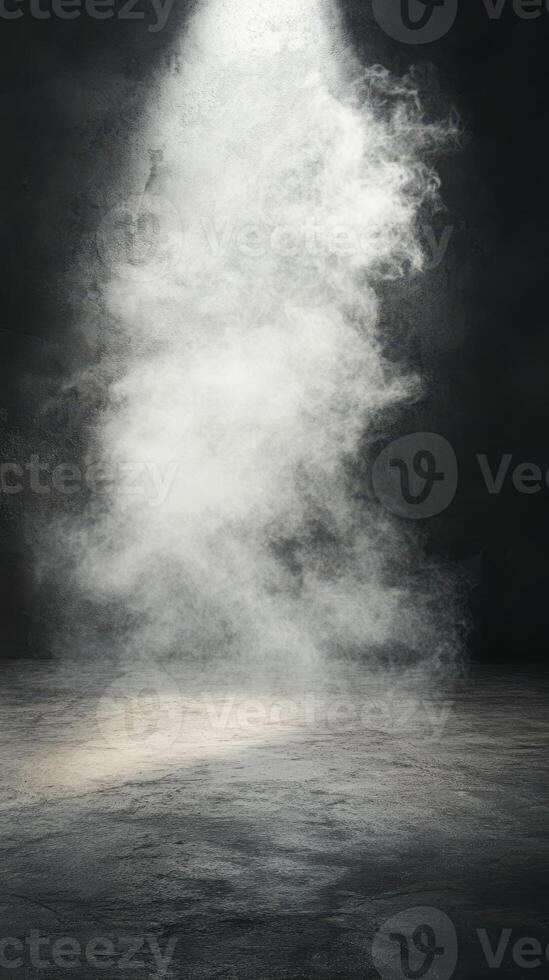 White smoke swirling on a dark background creates a mysterious atmosphere in an empty space photo